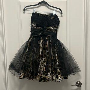 Perfect dress for a cocktail party birthday party or even a masquerade ball!